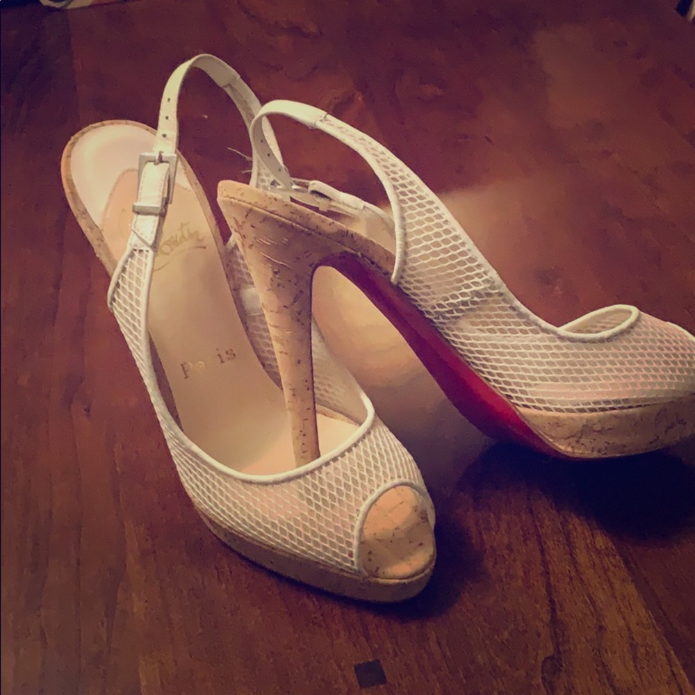 Beautiful white Christian Louboutin sandals.